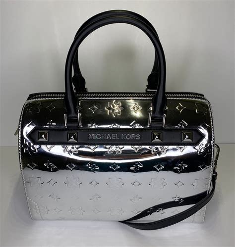 michael kors silver metallic purse.